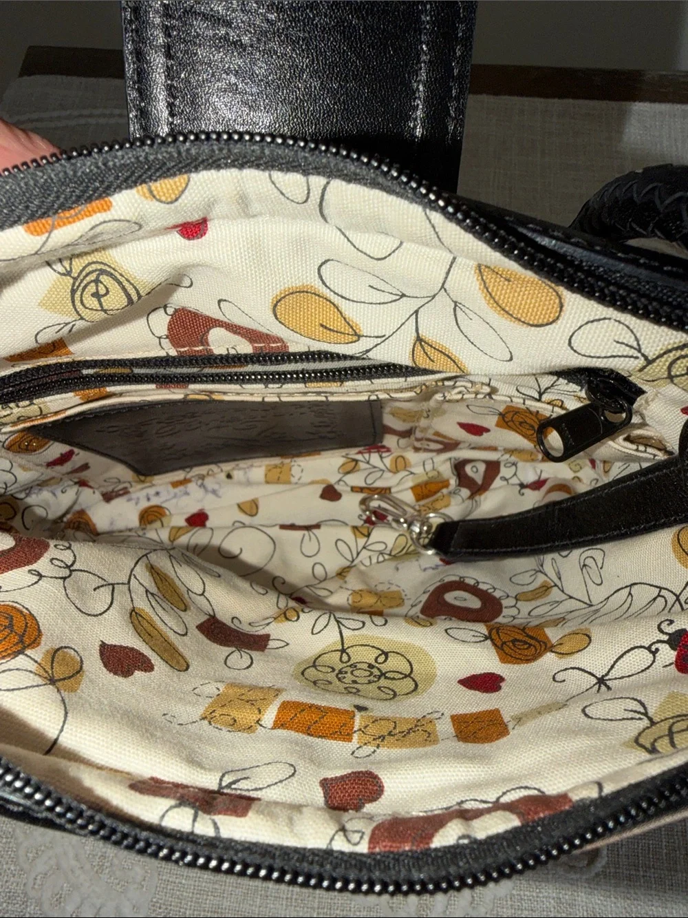 Brighton Black Woven Shoulder Bag with Brown Flap and Silver Heart Accent